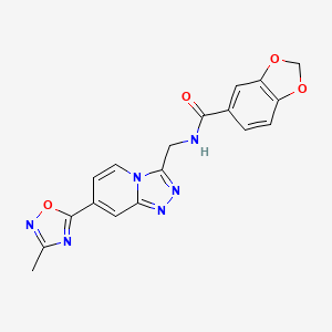 molecular formula C18H14N6O4 B2743473 N-((7-(3-甲基-1,2,4-噁二唑-5-基)-[1,2,4]三唑并[4,3-a]嘧啶-3-基)甲基)苯并[d][1,3]二噁烷-5-甲酰胺 CAS No. 2034598-79-1