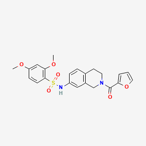 molecular formula C22H22N2O6S B2744176 N-(2-(furan-2-carbonyl)-1,2,3,4-tetrahydroisoquinolin-7-yl)-2,4-dimethoxybenzenesulfonamide CAS No. 955776-72-4