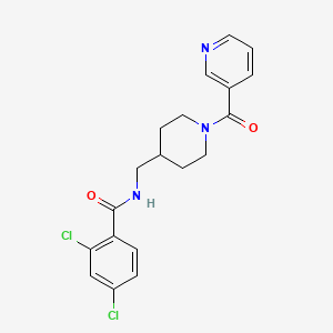 molecular formula C19H19Cl2N3O2 B2744369 2,4-dichloro-N-((1-nicotinoylpiperidin-4-yl)methyl)benzamide CAS No. 1396760-51-2
