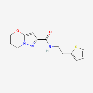 molecular formula C13H15N3O2S B2744476 N-(2-(thiophen-2-yl)ethyl)-6,7-dihydro-5H-pyrazolo[5,1-b][1,3]oxazine-2-carboxamide CAS No. 1448077-35-7