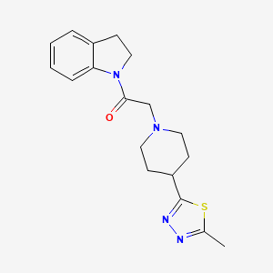 molecular formula C18H22N4OS B2744520 1-(茚啉-1-基)-2-(4-(5-甲基-1,3,4-噻二唑-2-基)哌啶-1-基)乙酮 CAS No. 1327295-67-9
