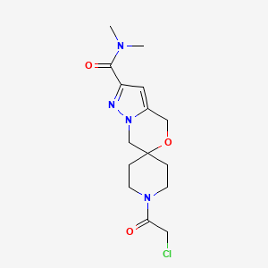 molecular formula C15H21ClN4O3 B2744522 1'-(2-Chloroacetyl)-N,N-dimethylspiro[4,7-dihydropyrazolo[5,1-c][1,4]oxazine-6,4'-piperidine]-2-carboxamide CAS No. 2411218-12-5
