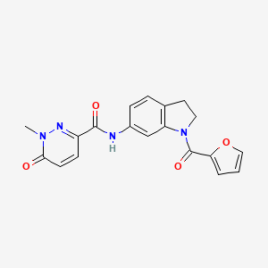 B2744939 N-(1-(furan-2-carbonyl)indolin-6-yl)-1-methyl-6-oxo-1,6-dihydropyridazine-3-carboxamide CAS No. 1286698-23-4