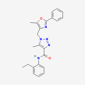 molecular formula C23H23N5O2 B2745594 N-(2-ethylphenyl)-5-methyl-1-((5-methyl-2-phenyloxazol-4-yl)methyl)-1H-1,2,3-triazole-4-carboxamide CAS No. 946242-57-5