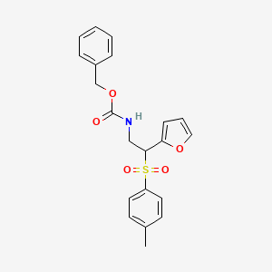 molecular formula C21H21NO5S B2745970 Benzyl (2-(furan-2-yl)-2-tosylethyl)carbamate CAS No. 877816-09-6