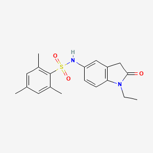 molecular formula C19H22N2O3S B2747034 N-(1-乙基-2-氧代吲哚-5-基)-2,4,6-三甲基苯磺酰胺 CAS No. 921556-60-7