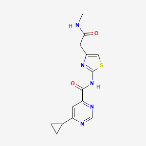 molecular formula C14H15N5O2S B2747181 6-Cyclopropyl-N-[4-[2-(methylamino)-2-oxoethyl]-1,3-thiazol-2-yl]pyrimidine-4-carboxamide CAS No. 2415538-77-9