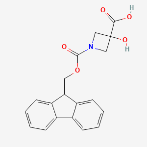 molecular formula C19H17NO5 B2747909 1-{[(9H-芴-9-基)甲氧基]羰基}-3-羟基氮杂环丁烷-3-羧酸 CAS No. 2044773-70-6