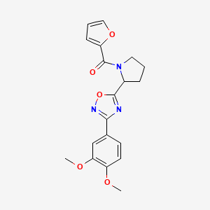 molecular formula C19H19N3O5 B2748233 3-(3,4-Dimethoxyphenyl)-5-[1-(2-furoyl)pyrrolidin-2-yl]-1,2,4-oxadiazole CAS No. 1788629-10-6