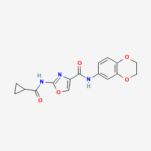 molecular formula C16H15N3O5 B2750563 2-(cyclopropanecarboxamido)-N-(2,3-dihydrobenzo[b][1,4]dioxin-6-yl)oxazole-4-carboxamide CAS No. 1351599-64-8