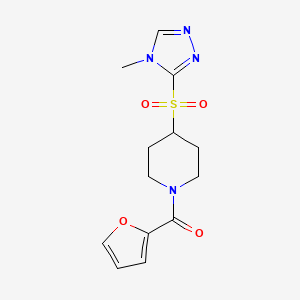 molecular formula C13H16N4O4S B2751543 furan-2-yl(4-((4-methyl-4H-1,2,4-triazol-3-yl)sulfonyl)piperidin-1-yl)methanone CAS No. 1448044-73-2