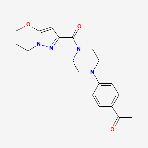 molecular formula C19H22N4O3 B2753115 1-(4-(4-(6,7-dihydro-5H-pyrazolo[5,1-b][1,3]oxazine-2-carbonyl)piperazin-1-yl)phenyl)ethanone CAS No. 1448132-58-8