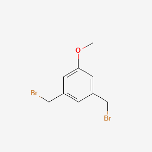 molecular formula C9H10Br2O B2753264 1,3-Bis(bromomethyl)-5-methoxybenzene CAS No. 19254-79-6