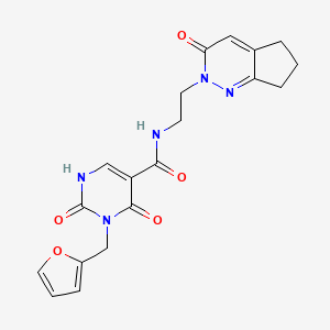 3-(furan-2-ylmethyl)-2,4-dioxo-N-(2-(3-oxo-3,5,6,7-tetrahydro-2H-cyclopenta[c]pyridazin-2-yl)ethyl)-1,2,3,4-tetrahydropyrimidine-5-carboxamide