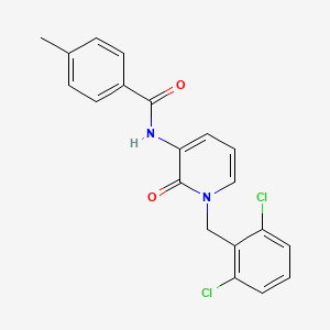 molecular formula C20H16Cl2N2O2 B2753672 N-[1-(2,6-dichlorobenzyl)-2-oxo-1,2-dihydro-3-pyridinyl]-4-methylbenzenecarboxamide CAS No. 338784-51-3