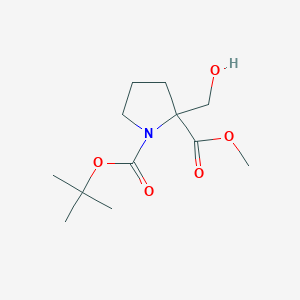molecular formula C12H21NO5 B2753755 1-Tert-butyl 2-methyl 2-(hydroxymethyl)pyrrolidine-1,2-dicarboxylate CAS No. 1621508-13-1