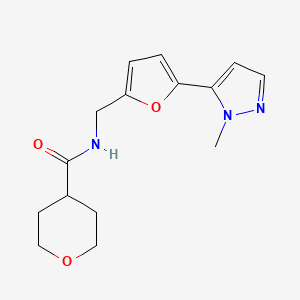N-[[5-(2-Methylpyrazol-3-yl)furan-2-yl]methyl]oxane-4-carboxamide