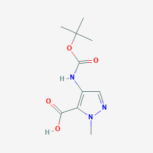 molecular formula C10H15N3O4 B2754862 4-{[(叔丁氧羰)氨基]-1-甲基-1H-嘧啶-5-甲酸 CAS No. 1506512-05-5