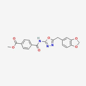 molecular formula C19H15N3O6 B2755365 Methyl 4-((5-(benzo[d][1,3]dioxol-5-ylmethyl)-1,3,4-oxadiazol-2-yl)carbamoyl)benzoate CAS No. 922123-01-1