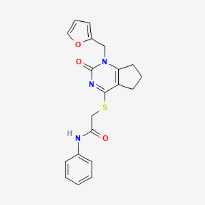 molecular formula C20H19N3O3S B2755452 2-[[1-(furan-2-ylmethyl)-2-oxo-6,7-dihydro-5H-cyclopenta[d]pyrimidin-4-yl]sulfanyl]-N-phenylacetamide CAS No. 946373-60-0