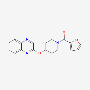 molecular formula C18H17N3O3 B2755470 Furan-2-yl(4-(quinoxalin-2-yloxy)piperidin-1-yl)methanone CAS No. 1704986-91-3