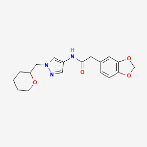 molecular formula C18H21N3O4 B2756326 2-(benzo[d][1,3]dioxol-5-yl)-N-(1-((tetrahydro-2H-pyran-2-yl)methyl)-1H-pyrazol-4-yl)acetamide CAS No. 2034612-41-2