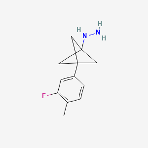 molecular formula C12H15FN2 B2756489 [3-(3-Fluoro-4-methylphenyl)-1-bicyclo[1.1.1]pentanyl]hydrazine CAS No. 2287343-90-0