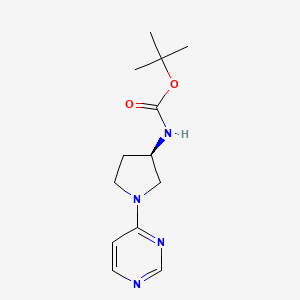 molecular formula C13H20N4O2 B2757395 tert-Butyl N-[(3R)-1-(pyrimidin-4-yl)pyrrolidin-3-yl]carbamate CAS No. 1365936-51-1