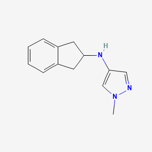 molecular formula C13H15N3 B2758703 N-(2,3-dihydro-1H-inden-2-yl)-1-methylpyrazol-4-amine CAS No. 1153973-24-0