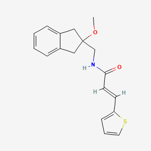 (E)-N-((2-methoxy-2,3-dihydro-1H-inden-2-yl)methyl)-3-(thiophen-2-yl)acrylamide