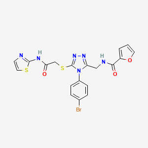 molecular formula C19H15BrN6O3S2 B2759297 N-((4-(4-bromophenyl)-5-((2-oxo-2-(thiazol-2-ylamino)ethyl)thio)-4H-1,2,4-triazol-3-yl)methyl)furan-2-carboxamide CAS No. 392684-99-0
