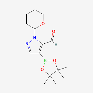 molecular formula C15H23BN2O4 B2760017 2-(氧杂环戊-2-基)-4-(四甲基-1,3,2-二氧杂硼杂环戊-2-基)吡唑并[1,5-a]吡唑-3-甲醛 CAS No. 2377587-58-9