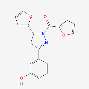 molecular formula C18H14N2O4 B2760387 3-[1-(furan-2-carbonyl)-5-(furan-2-yl)-4,5-dihydro-1H-pyrazol-3-yl]phenol CAS No. 927625-53-4