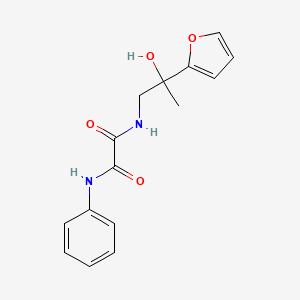molecular formula C15H16N2O4 B2760765 N1-(2-(furan-2-yl)-2-hydroxypropyl)-N2-phenyloxalamide CAS No. 1396791-27-7