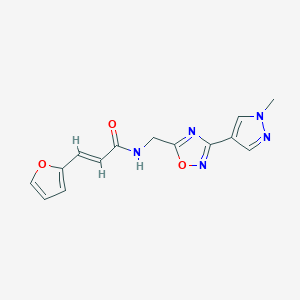 (E)-3-(furan-2-yl)-N-((3-(1-methyl-1H-pyrazol-4-yl)-1,2,4-oxadiazol-5-yl)methyl)acrylamide