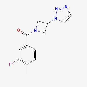 molecular formula C13H13FN4O B2762570 (3-(1H-1,2,3-triazol-1-yl)azetidin-1-yl)(3-fluoro-4-methylphenyl)methanone CAS No. 2034307-03-2