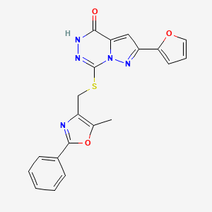 molecular formula C20H15N5O3S B2763945 2-(2-furyl)-7-{[(5-methyl-2-phenyl-1,3-oxazol-4-yl)methyl]thio}pyrazolo[1,5-d][1,2,4]triazin-4(5H)-one CAS No. 1223972-75-5