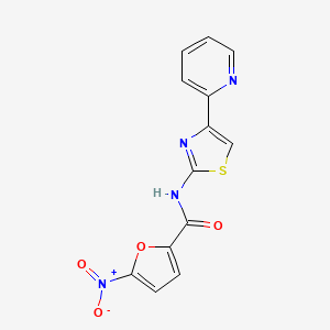 molecular formula C13H8N4O4S B2764483 5-nitro-N-(4-(pyridin-2-yl)thiazol-2-yl)furan-2-carboxamide CAS No. 361479-23-4