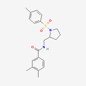 3,4-dimethyl-N-((1-tosylpyrrolidin-2-yl)methyl)benzamide