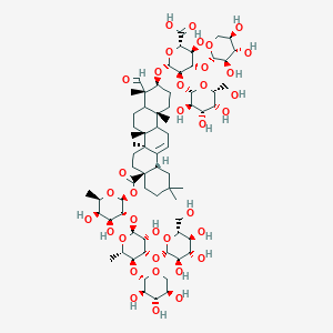 molecular formula C70H110O36 B2766442 (2S,3S,4S,5R,6R)-6-[[(3S,4S,6aR,6bS,8aS,12aS,14bR)-8a-[(2S,3R,4S,5R,6R)-4,5-dihydroxy-3-[(2S,3R,4S,5S,6S)-3-hydroxy-6-methyl-4-[(2S,3R,4S,5S,6R)-3,4,5-trihydroxy-6-(hydroxymethyl)oxan-2-yl]oxy-5-[(2S,3R,4S,5R)-3,4,5-trihydroxyoxan-2-yl]oxyoxan-2-yl]oxy-6-methyloxan-2-yl]oxycarbonyl-4-formyl-4,6a,6b,11,11,14b-hexamethyl-1,2,3,4a,5,6,7,8,9,10,12,12a,14,14a-tetradecahydropicen-3-yl]oxy]-3-hydroxy-5-[(2S,3R,4S,5R,6R)-3,4,5-trihydroxy-6-(hydroxymethyl)oxan-2-yl]oxy-4-[(2S,3R,4S,5R)-3,4,5-trihydroxyoxan-2-yl]oxyoxane-2-carboxylic acid CAS No. 133632-80-1