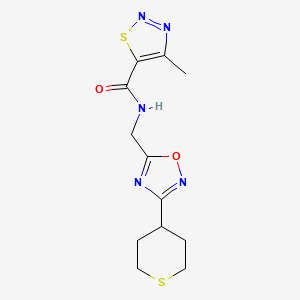 4-methyl-N-{[3-(thian-4-yl)-1,2,4-oxadiazol-5-yl]methyl}-1,2,3-thiadiazole-5-carboxamide