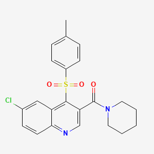 molecular formula C22H21ClN2O3S B2767447 (6-Chloro-4-tosylquinolin-3-yl)(piperidin-1-yl)methanone CAS No. 1111015-15-6