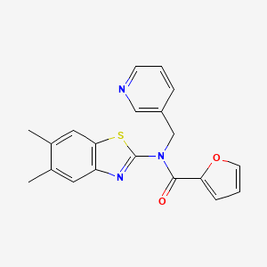 N-(5,6-dimethyl-1,3-benzothiazol-2-yl)-N-[(pyridin-3-yl)methyl]furan-2-carboxamide