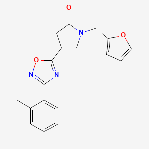 molecular formula C18H17N3O3 B2767889 1-(2-呋喃甲基)-4-[3-(2-甲基苯基)-1,2,4-噁二唑-5-基]吡咯啉-2-酮 CAS No. 1171627-89-6