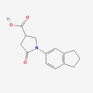 molecular formula C14H15NO3 B2768988 1-(2,3-dihydro-1H-inden-5-yl)-5-oxopyrrolidine-3-carboxylic acid CAS No. 923106-38-1