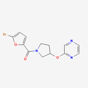 molecular formula C13H12BrN3O3 B2770528 (5-溴呋喃-2-基)(3-(吡啶-2-氧基)吡咯烷-1-基)甲酮 CAS No. 2034582-75-5