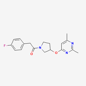 1-{3-[(2,6-Dimethylpyrimidin-4-yl)oxy]pyrrolidin-1-yl}-2-(4-fluorophenyl)ethan-1-one