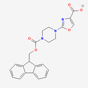 molecular formula C23H21N3O5 B2771257 2-[4-(9H-Fluoren-9-ylmethoxycarbonyl)piperazin-1-yl]-1,3-oxazole-4-carboxylic acid CAS No. 2253638-87-6