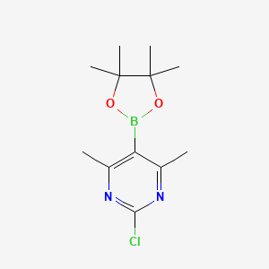 molecular formula C12H18BClN2O2 B2771657 2-Chloro-4,6-dimethyl-5-(4,4,5,5-tetramethyl-1,3,2-dioxaborolan-2-yl)pyrimidine CAS No. 2304635-65-0