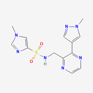 molecular formula C13H15N7O2S B2772008 1-methyl-N-((3-(1-methyl-1H-pyrazol-4-yl)pyrazin-2-yl)methyl)-1H-imidazole-4-sulfonamide CAS No. 2034230-82-3